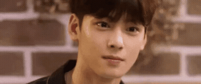 Young Man With Brick Wall Behind Him GIF