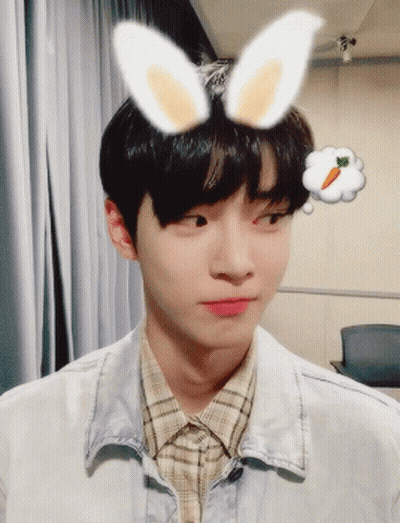 Young Man with Bunny Ears and Carrot Thought