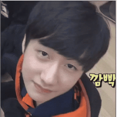 Young Man With Chinese Writing GIF