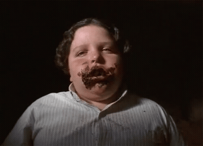Young Man With Chocolate On Face In Striped Shirt GIF