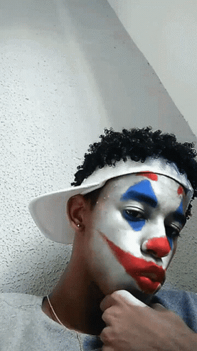 Young Man With Clown Makeup GIF