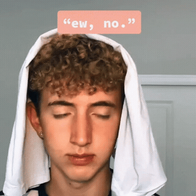 Young Man With Curly Hair And Towel Saying Ew No GIF