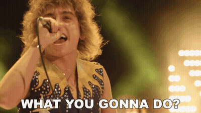 Young Man With Curly Hair Close Up GIF