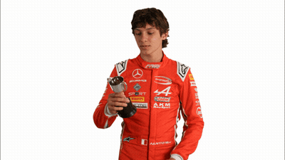 Young Man With Curly Hair Making Funny Face Saying It's Boring GIF