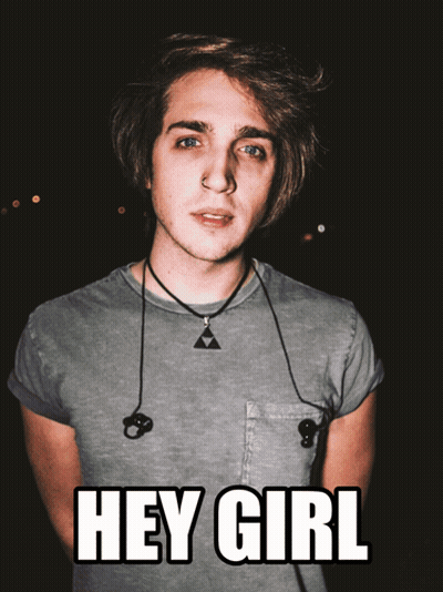 Young Man With Ear Buds And Necklace Saying Hey Girl GIF