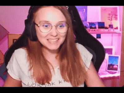 Young Man With Ear Buds Making Funny Face GIF