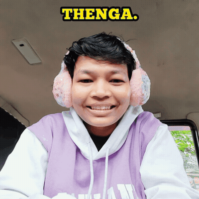 Young Man With Ear Warmers And Purple Shirt Saying Thenga GIF