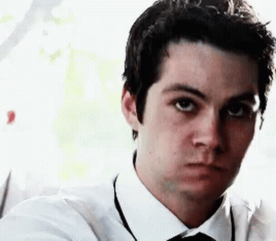 Young Man With Fangs Standing In Hallway Eyes Closed GIF