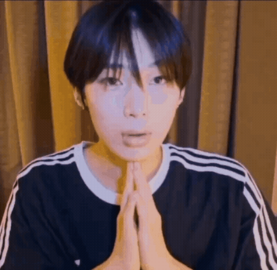 Young Man With Folded Hands GIF