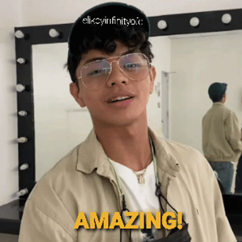 Young Man With Glasses And Hat Saying Amazing GIF