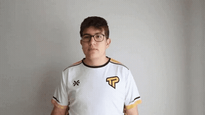 Young Man With Glasses And White Shirt Looking At Camera GIF