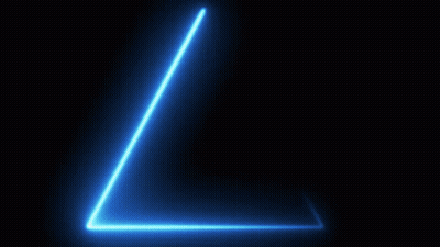 Young Man With Glasses In Front Of Tam Tastic Neon Sign GIF