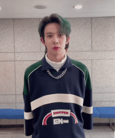 Young Man With Green Hair Wearing Enhypen Shirt GIF