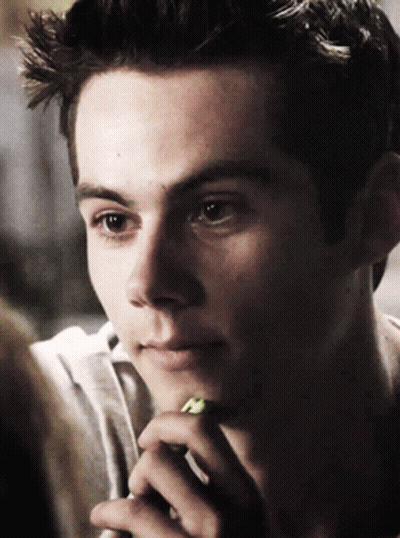 Young Man With Green Pencil Close Up GIF