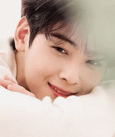 Young Man With Hand On Chin Close Up GIF