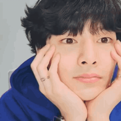 Young Man With Hands On Face GIF