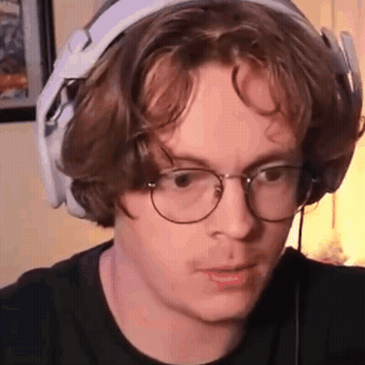 Young Man With Headphones And Glasses Making Funny Face GIF
