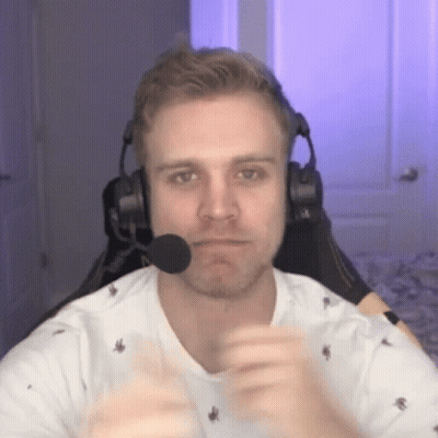 Young Man With Headphones And Microphone Sitting In Chair GIF