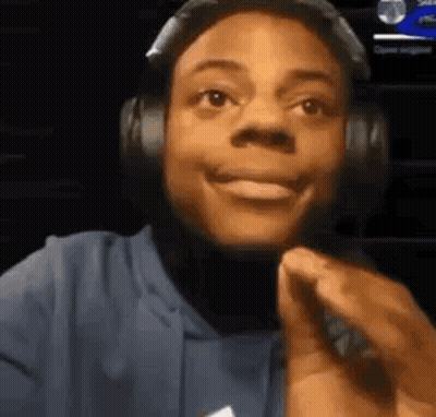 Young Man With Headphones And Microphone Smiling GIF