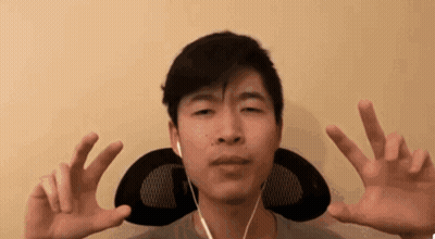 Young Man With Headphones Making Peace Sign GIF