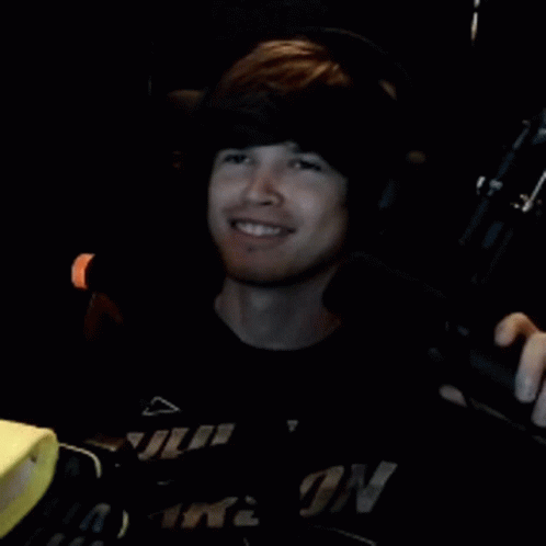 Young Man With Headphones Wearing No Time Shirt GIF