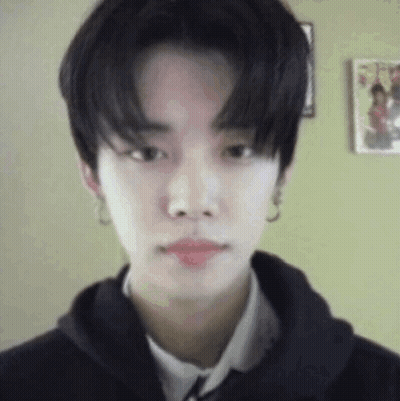 Young Man With Hoodie And Earrings GIF
