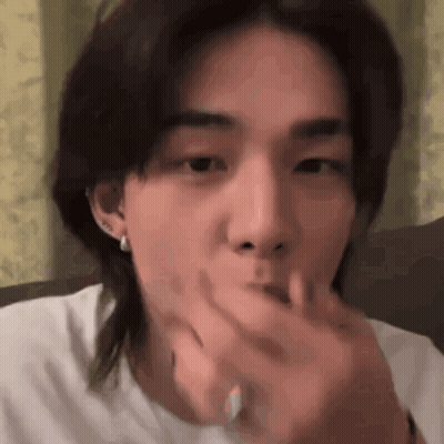 Young Man With Long Hair Eating With Hand GIF