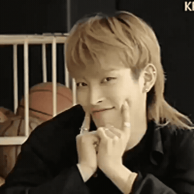 Young Man With Mullet Making Face GIF