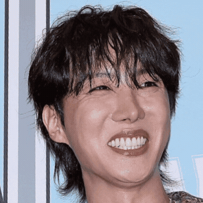 Young Man With Mullet Smiling GIF
