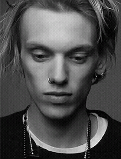 Young Man With Nose Ring Earrings And Necklace GIF