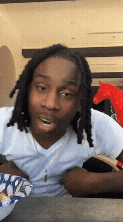 Young Man With Open Mouth Showing Teeth GIF