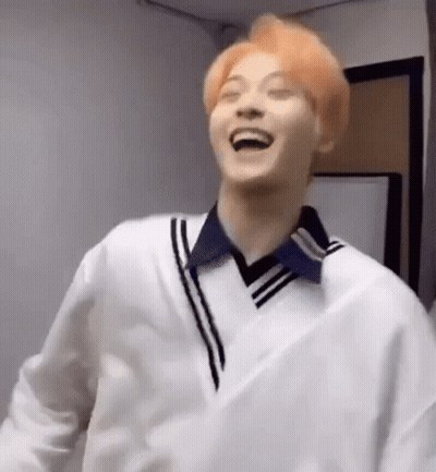 Young Man With Orange Hair Laughing GIF