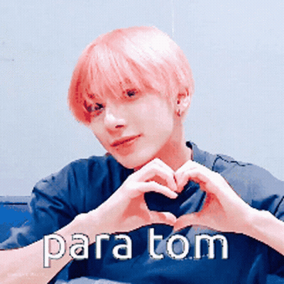 Young Man With Pink Hair Making Heart Shape Saying Para Tom GIF