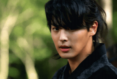 Young Man With Ponytail GIF