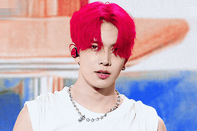 Young Man With Red Hair and Necklace