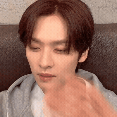 Young Man With Red Hair Making Funny Face On Couch GIF