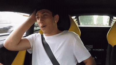 Young Man With Seat Belt Around Neck In Car GIF