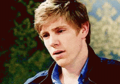 Young Man With Serious Expression GIF