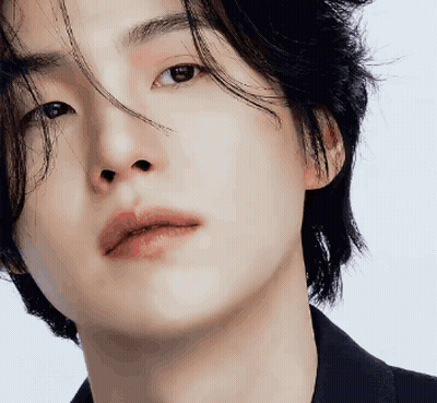 Young Man With Serious Face GIF