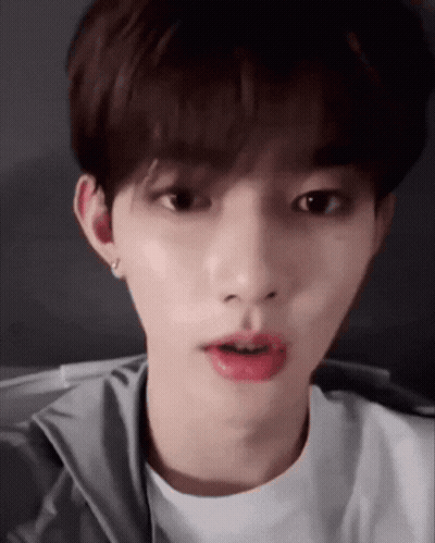 Young Man With White Shirt And Red Lips GIF