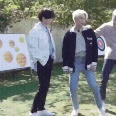 Young Men By Target In Field GIF