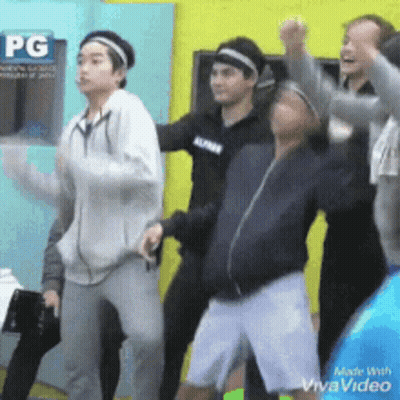 Young Men Dancing In Front Of PG Sign GIF