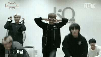 Young Men Dancing In Front Of Studio Sign GIF