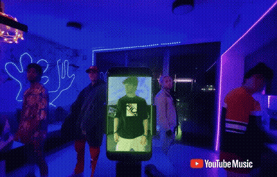 Young Men Dancing In Front Of YouTube Music Ad GIF