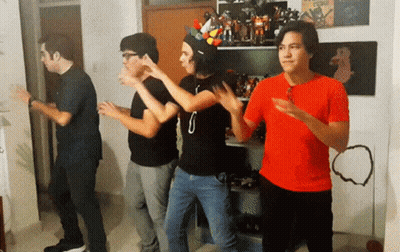 Young Men Dancing In Room With Lego Shelf GIF