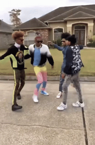 Young Men Dancing On Sidewalk GIF
