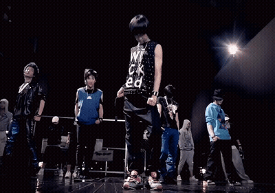Young Men Dancing On Stage With 14 Shirt GIF