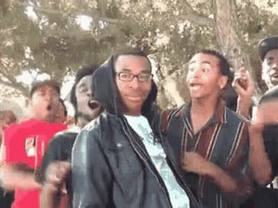 Young Men Dancing, One Wearing Hoodie And Glasses GIF