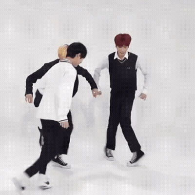 Young Men Dancing Together GIF