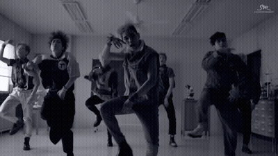 Young Men Dancing Under SM Entertainment Ceiling GIF